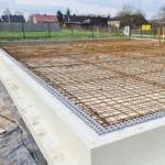 Izolacja fundamentów – wybór odpowiednich materiałów budowlanych